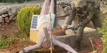 An Israeli soldier vandalized a statue of Jesus