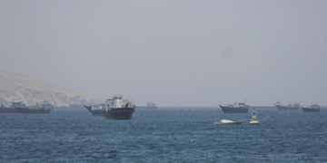 Iran Escalates Attacks on Ships and UAE Port in Strait of Hormuz Conflict