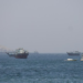 Iran Escalates Attacks on Ships and UAE Port in Strait of Hormuz Conflict