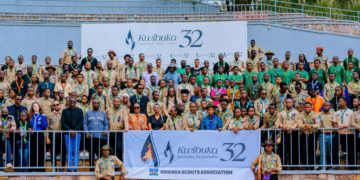 Young members of the Rwanda Scouts Association lay wreaths during a genocide commemoration event.