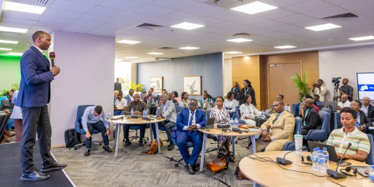 Health data experts attending the workshop on National Health Intelligence Centre data integration in Kigali.