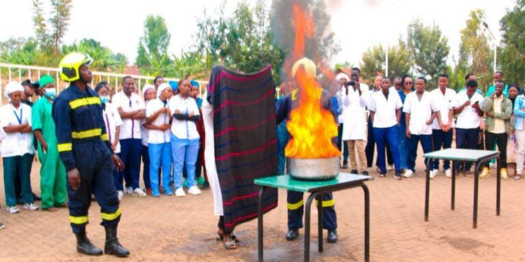 Police in Huye Train Hospital Staff and Caregivers on Fire Prevention and Response