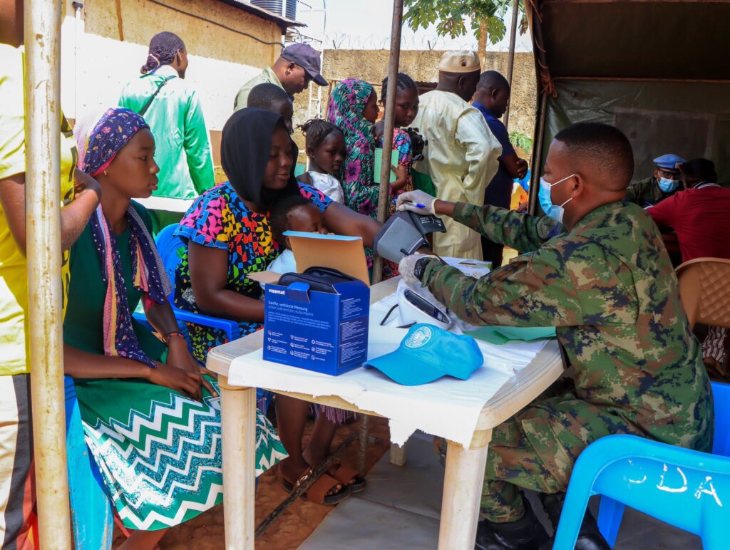 Rwandan peacekeepers providing free medical care to inmates at Bossembele Prison in CAR